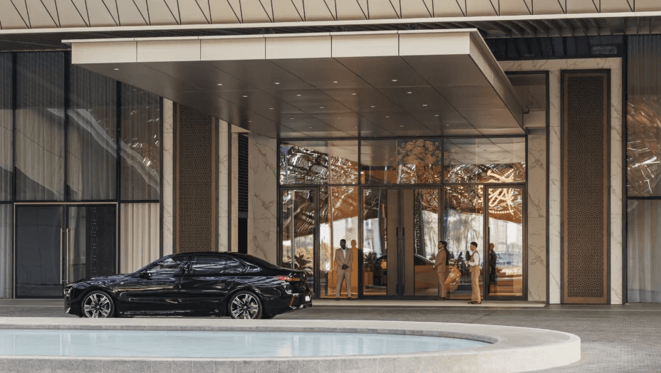 Chauffeur-driven car waiting to collect guests