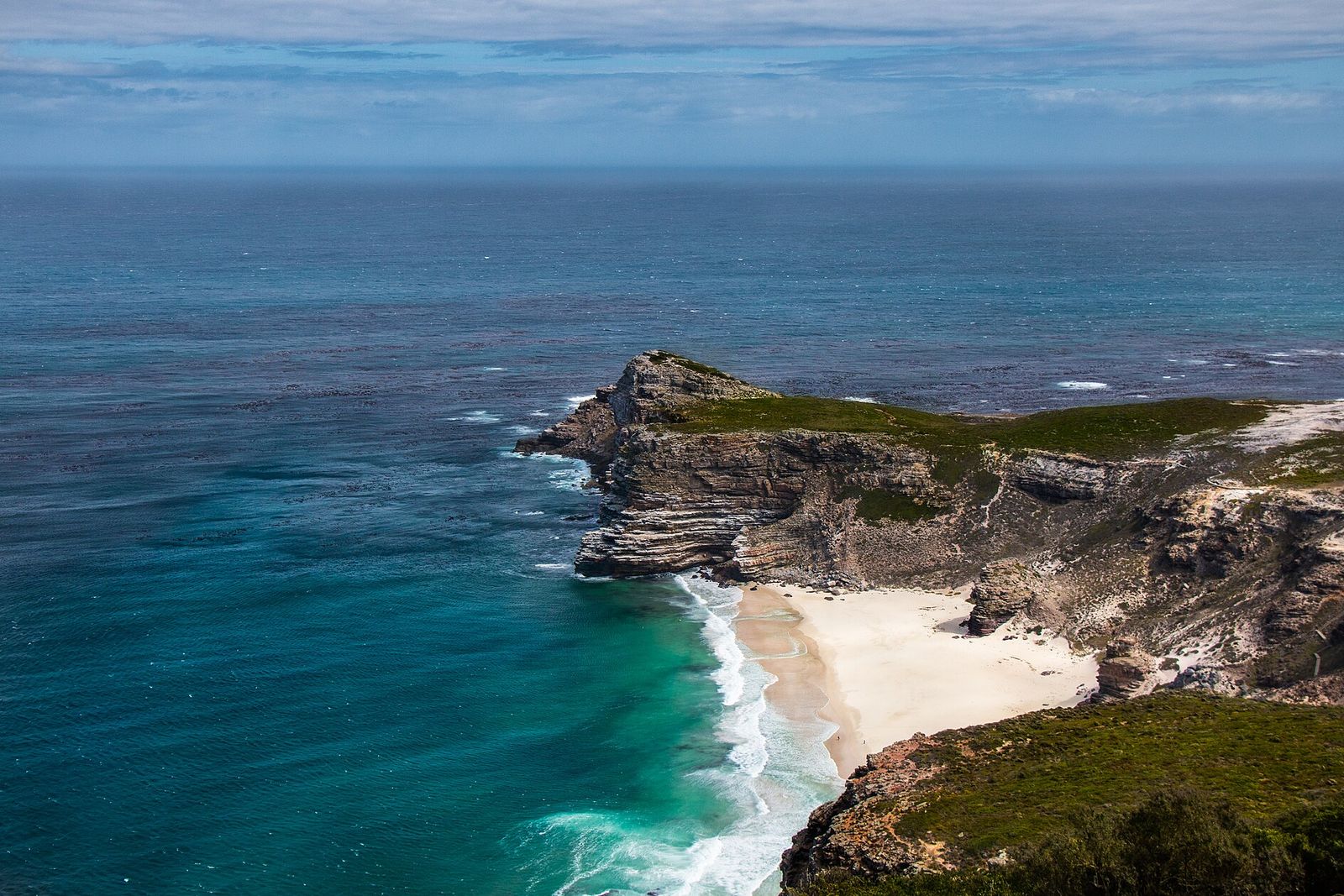 Cliffs and a white-sand cove at the tip of the Cape Peninsula