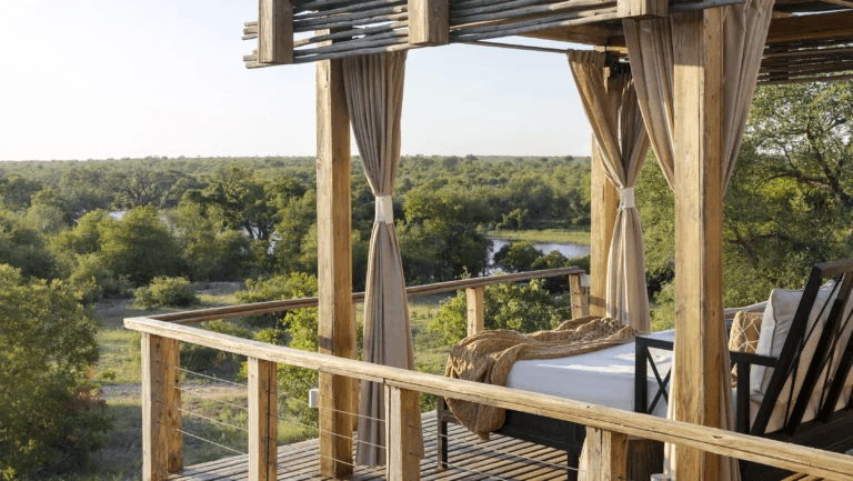 Tented suite deck overlooking a river valley