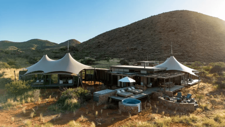 Tented lodge at the foot of a hill in the Kalahari