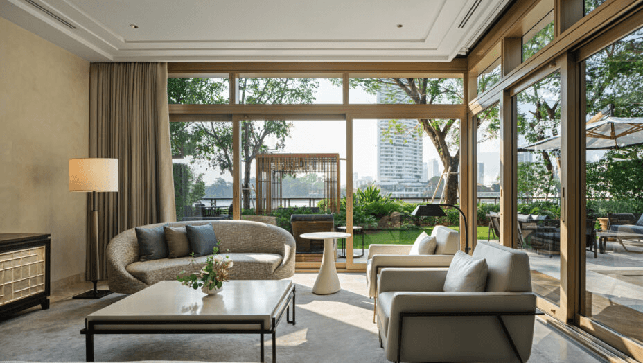 Riverside suite living room with floor-to-ceiling windows