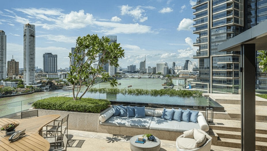 Terrace lounge overlooking the river and city towers