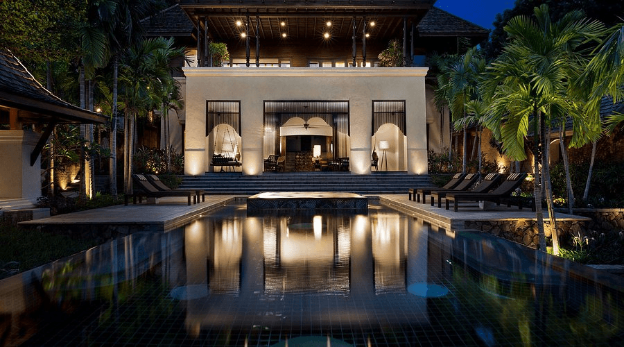 Lanna-style pavilion with a plunge pool in a garden